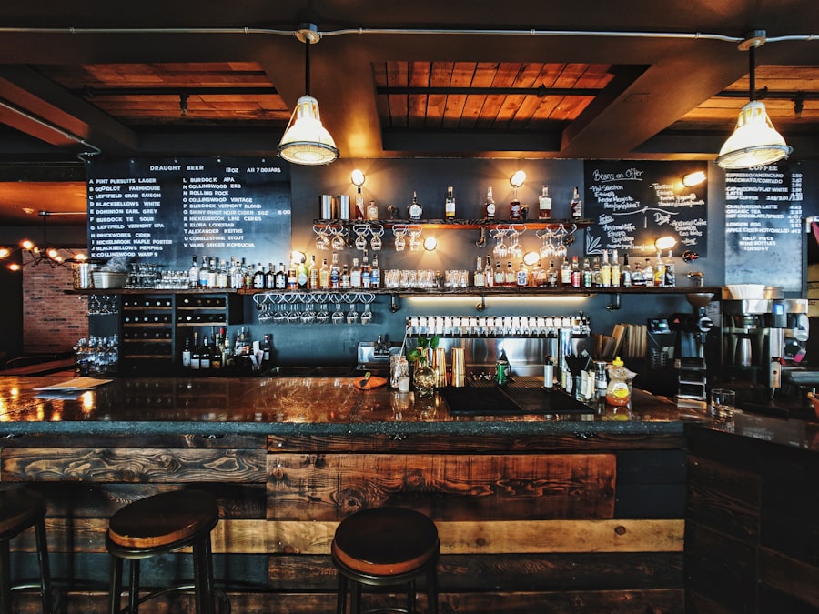 The bar at a classic tavern, lit warm in the evening